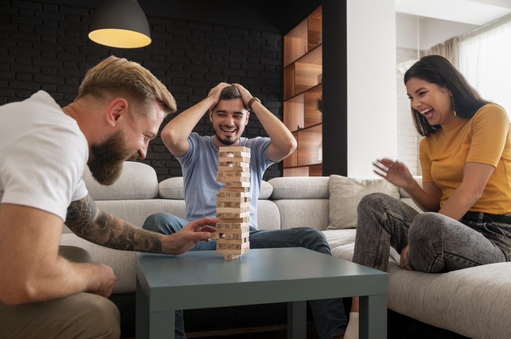 Adults playing board games